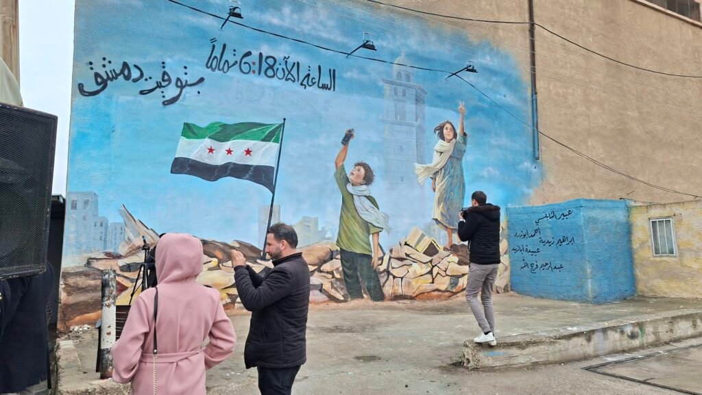 جدارية في درعا تحاكي الثورة والنصر 